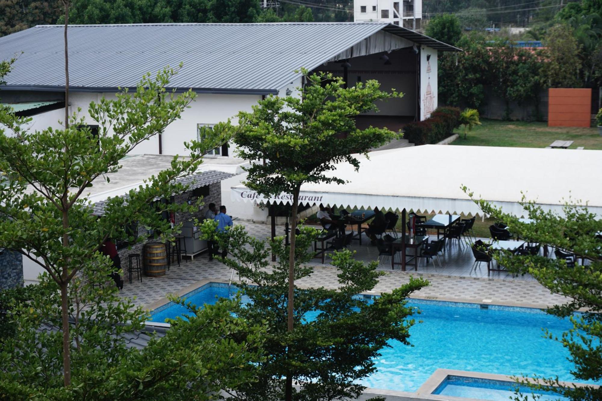 Vistar Resort & Hotels Kammasandra Buitenkant foto